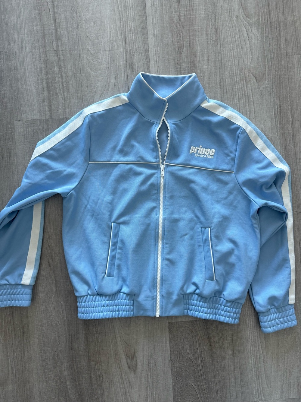 Sporty & Rich x Prince Light Blue Track Bomber Jacket with White Stripes